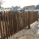 Wooden paling fencing offering security around a property in Birmingham.