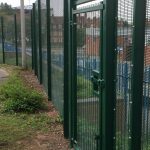 Green double wire mesh gates, with secure locking system. These commercial gates are perfect for securing school yards.