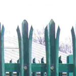 Green steel palisade fencing.