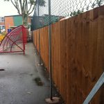 Commercial fencing providing security to a school yard.