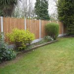 Wooden garden fencing on display at a fencing suppliers in Birmingham.